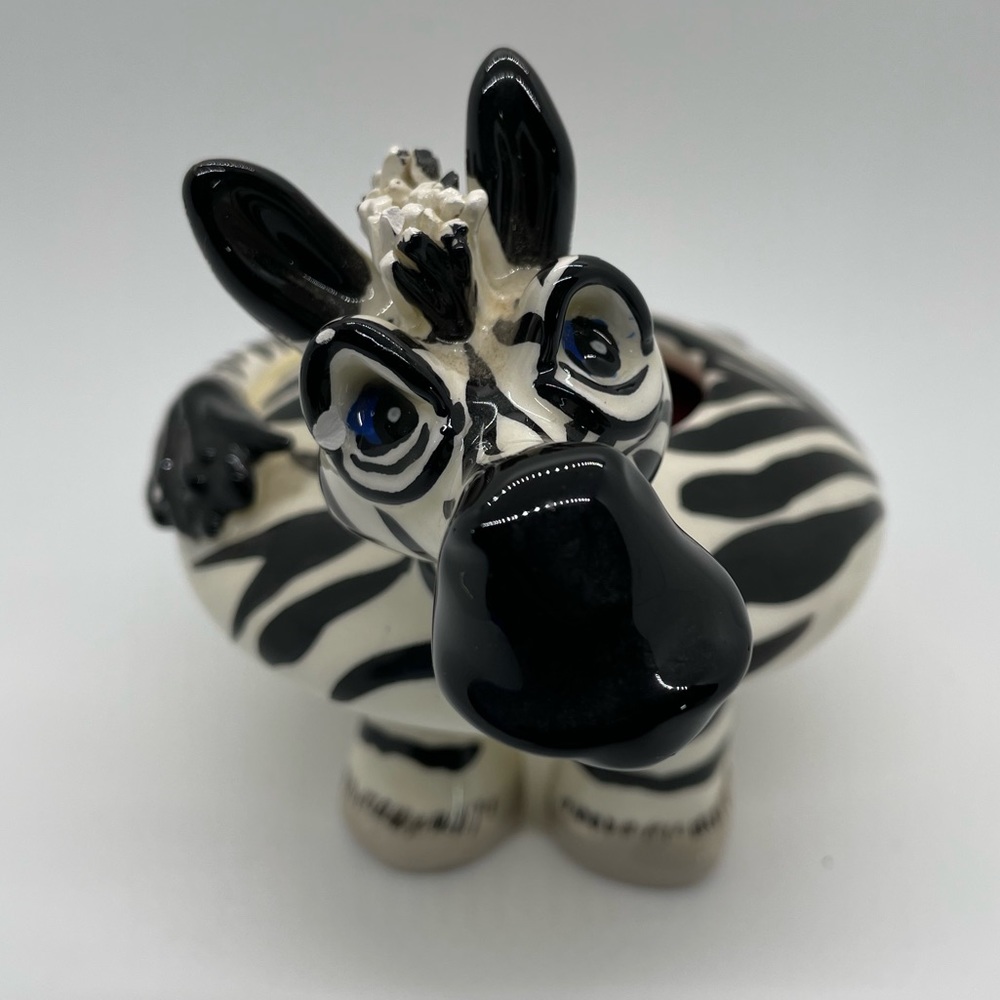 Studio SWAK - Lynda Cornielle, Zebra tea light holder.